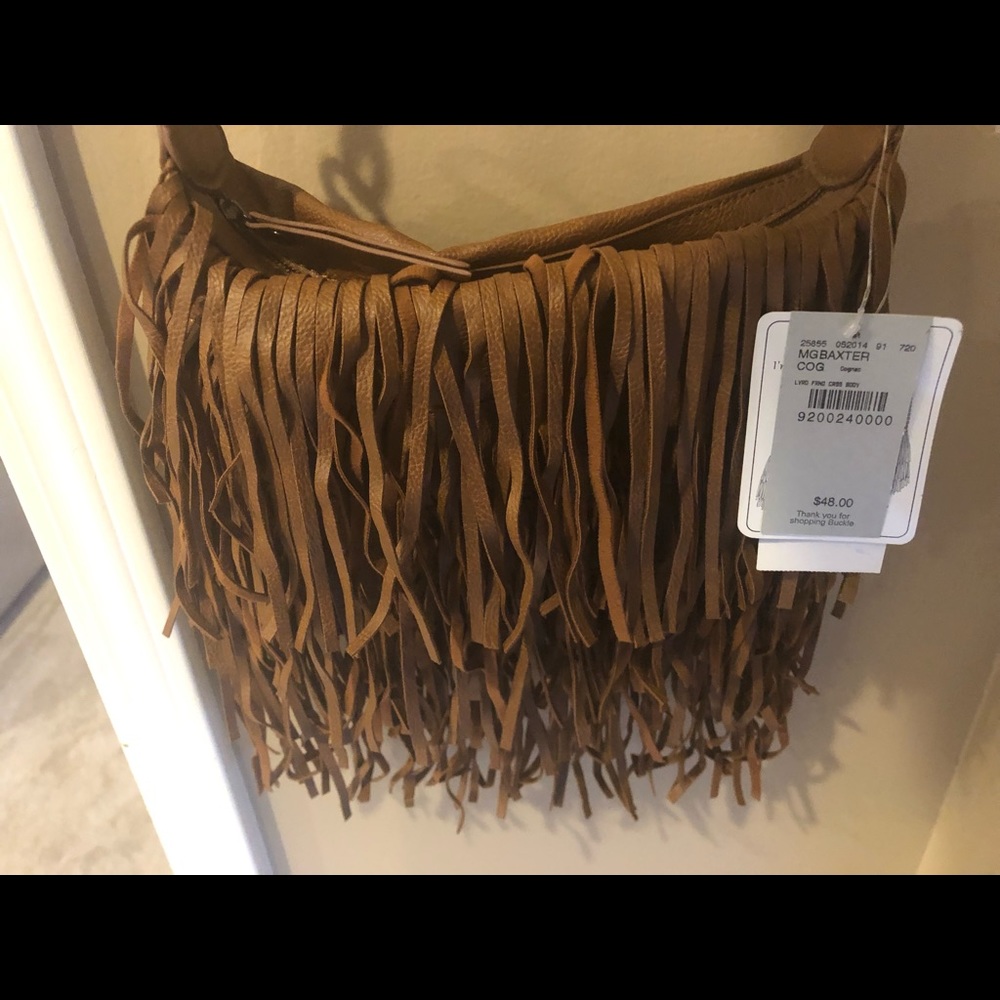 Brand new fringe Cross body bag by madden girl.
